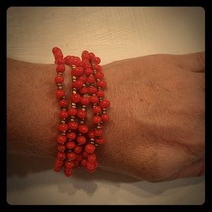 Red and Gold Plastic Bracelets